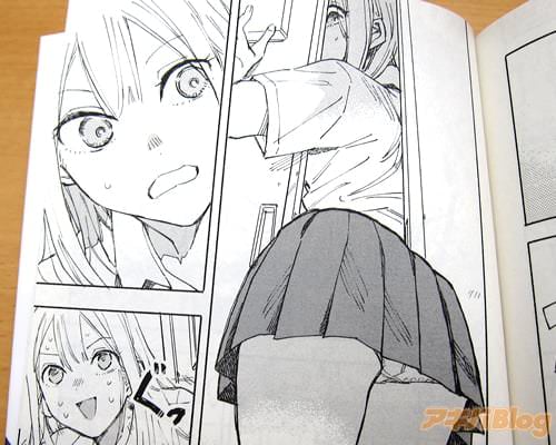 扉にはさまれた女子高生